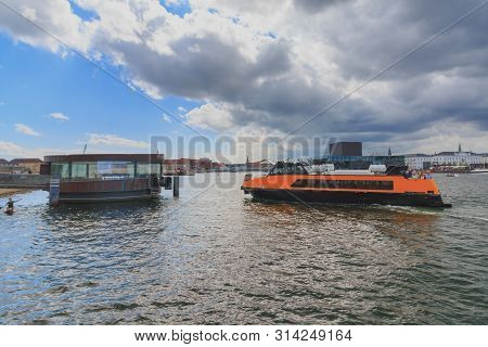 Copenhagen, Zealand Denmark - July 21 2019: Yellow Public Transportation Boat Bus At Copenhagen On D