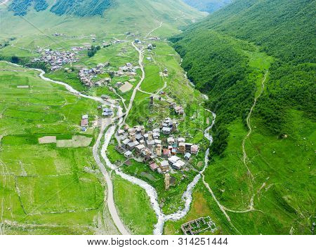 View Of The Ushguli Village At The Foot Of Mt. Shkhara. Picturesque And Gorgeous Scene. Rock Tower T