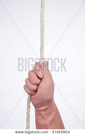 A Hand With A Kitchen Glove, Has Clung To A Rope