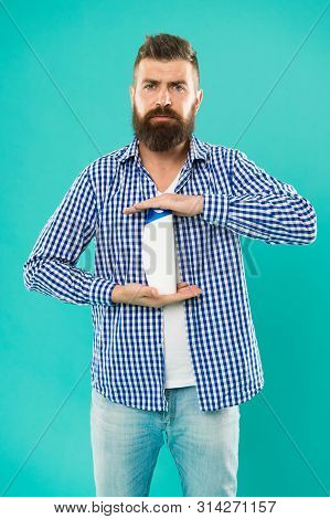 Man Hold Shampoo Bottle. Shampoo And Conditioner You Choose Can Make All Difference In Hair Starting