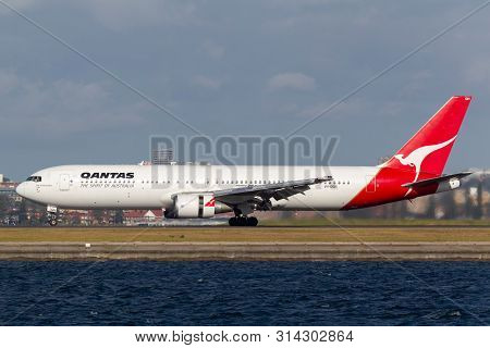 Sydney, Australia - October 7, 2013: Qantas Boeing 767 Airliner Landing At Sydney Airport.