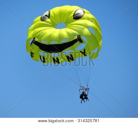Parasales - Water Parachute In The Blue Sky.