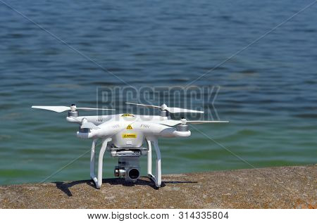 Drone quadrocopter DJI Phantom 3 Pro explores storage pool of hydroelectric station. After Chernobyl disaster - collection active sediments. Dnepr river. July 29, 2019.Kiev ,Ukraine 