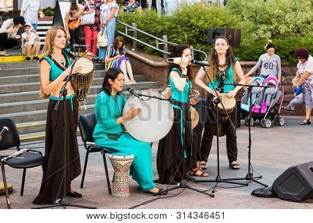 Grodno, Grodno Region, Belarus - 7/27/2019: On July 27, 2019, In The Center Of Grodno, Musicians Pla
