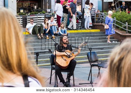 Grodno, Grodno Region, Belarus - 7/27/2019: On July 27, 2019, In The Center Of Grodno, Musicians Pla