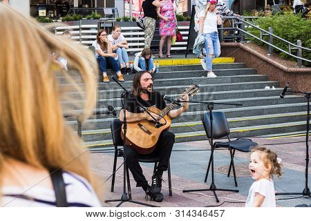 Grodno, Grodno Region, Belarus - 7/27/2019: On July 27, 2019, In The Center Of Grodno, Musicians Pla