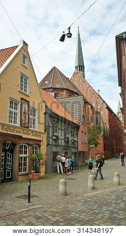 Bremen, Germany - 07 23 2015 - Medieval Street Schnoor With Half-timbered Houses In The Centre Of Th
