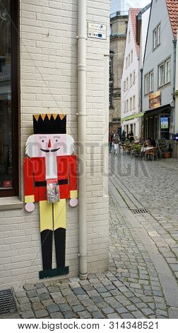 Bremen, Germany - 07 23 2015 - View Of Decor Nutcracker On The Wall Of House In Medieval Street Schn