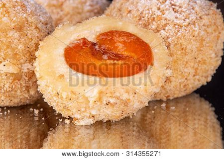 Austrian And Czech Sweet Dessert Knedles Apricot Dumplings With Reflection. Filled Cottage Cheese Do