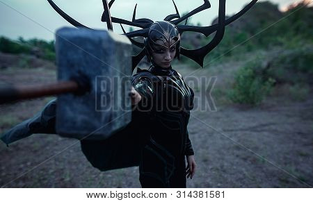Dnipro, Ukraine- June 5, 2019: Cosplayers Portray Battle Of Goddess Of Death Hela And Superhero Thor