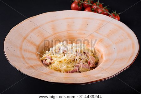 Gluten Free Spaghetti Pasta Alla Carbonara With With Bacon, Egg Yolk Served With Cheese Carbonara Sa