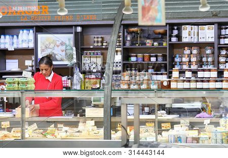 Paris France - May 23, 2019: Unidentified People Work At Cheese And Jam Shop Marche Des Enfants Roug