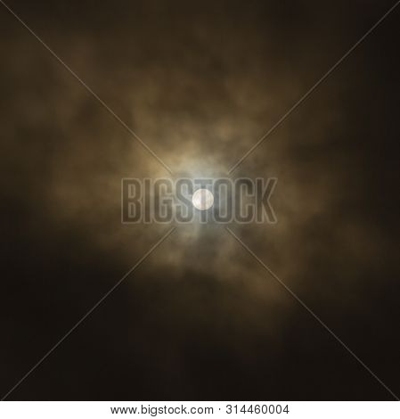 Afternoon Sun Disс Through Heavy Clouds Covered Eye Of Summer