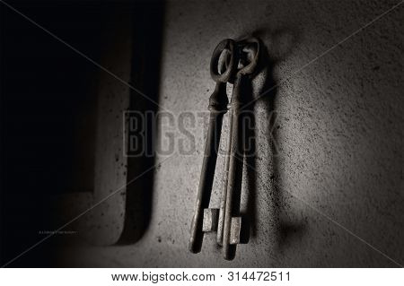 Old Rusted Keys Hanging On The Wall