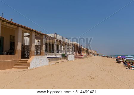 Playa Babilonia Guardamar De Segura Costa Blanca Old Town With Houses On The Sandy Beach