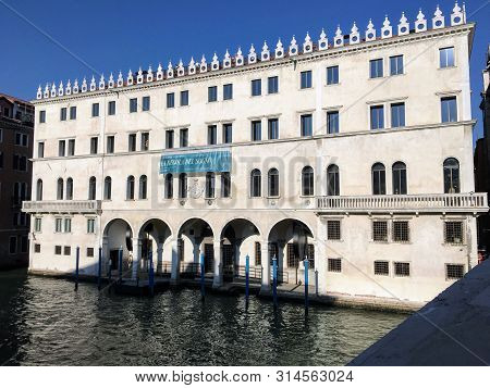Venice, Italy - July 2nd, 2019: A Closeup View Of The Famous T Fondaco Dei Tedeschi, A Famous High E