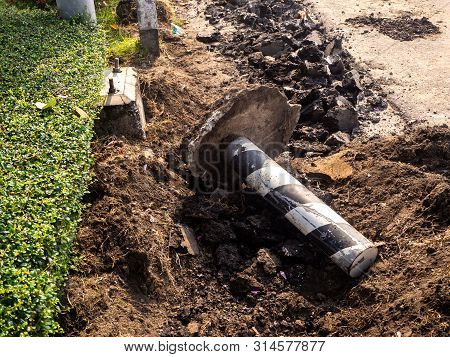 The Road Repairing Works With Jackhammer. Machine Drills Asphalt