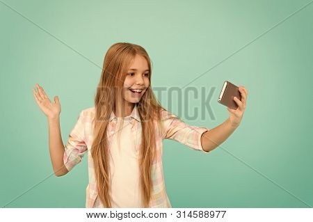 Hello World This Is My Channel. Let Me Take Selfie. Child Girl Hold Smartphone. Video Call Concept. 