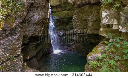 Waterfall On Soca River Near Kobarid In Slovenia
