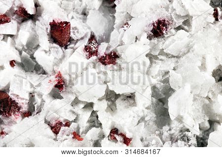 Closeup Of Cinnabar On White Dolomite Mineral Stone, Pattern Background With Details Of Mineralogy A