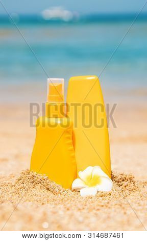 Sunblock On The Beach. Sun Protection. Selective Focus.