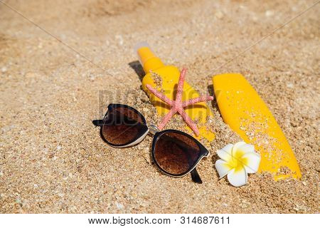 Sunblock On The Beach. Sun Protection. Selective Focus.