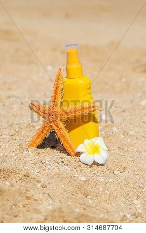 Sunblock On The Beach. Sun Protection. Selective Focus.