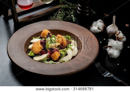 Tasty Homemade Cheese Donuts Jam, Poured With Pear And Salad.