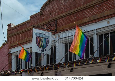 Tampa Bay, Florida. July 12, 2019 Southern Nights Tampa And Colorful Gay Flags At Ybor City.