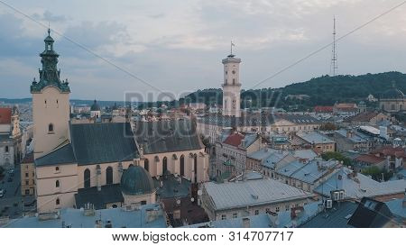Aerial Roofs And Streets Old City Lviv, Ukraine. Central Part Of Old European City In Morning. Panor
