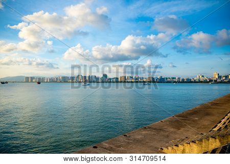 Sanya Town Evening Cityscape, View From Phoenix Island On Hainan Island In China
