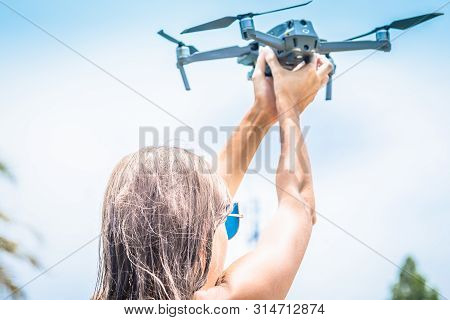 Female Hand Launches Drone For Flight, With Which You Can Take Photos And Video Filming, Close-up.