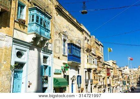 Senglea, Malta - May 4: View Of Colorful Street With Flags In Senglea, Malta On May 4, 2018