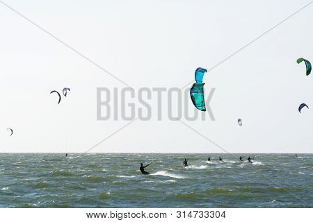 Water Sport Event, Kite Surfers Race In North Sea Near Renesse, Zeeland, Netherlands