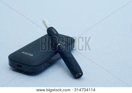 Caslano, Ticino, Switzerland - 26th July 2019 : Picture Of Iqos A New Heat-not-burn Tobacco Product 