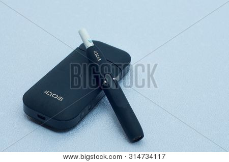 Caslano, Ticino, Switzerland - 26th July 2019 : Picture Of Iqos A New Heat-not-burn Tobacco Product 