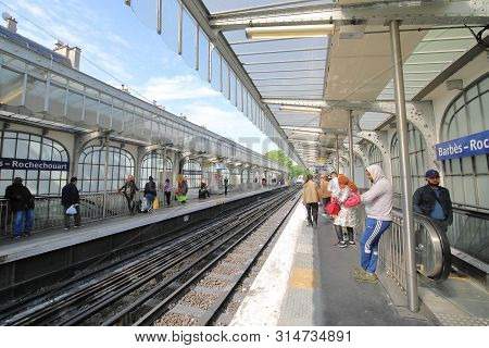 Paris France - May 24, 2019: Unidentified People Wait For Train At Barbes Rochechouart Station Paris