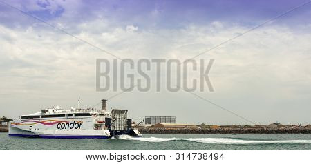 St Helier, United Kingdom, - 07, 25, 2019: View From The Sea Of A Car Ferry Arriving In Port