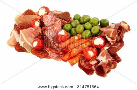 Gran Antipasto Snack Selection With Salami And Cured Meat Slices Isolated On A White Background