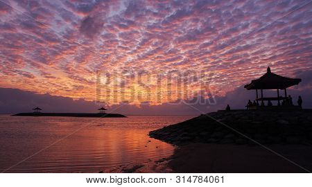 Amazing Sunset Sunrise Colors Background. Dramatic Colorful Sky Backgrounds. Reflection On The Water
