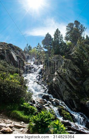 Landscape With Waterfall In The Mountains In Summer At Parc Natural Del Comapedrosa, Arinsal, Andorr