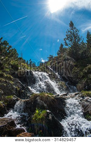 Landscape With Waterfall In The Mountains In Summer At Parc Natural Del Comapedrosa, Arinsal, Andorr