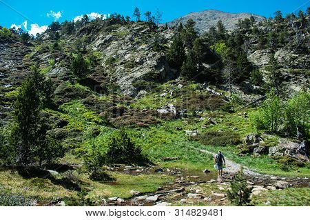 Hiking In Mountains In Summer At Parc Natural Del Comapedrosa, Andorra