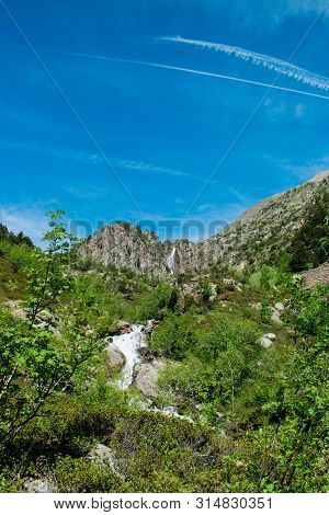 Landscape With Waterfall In The Mountains In Summer At Parc Natural Del Comapedrosa, Arinsal, Andorr
