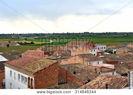Catalonia, Bell Lloc Urgell Town; Typical Roofs And Cereal Fields
