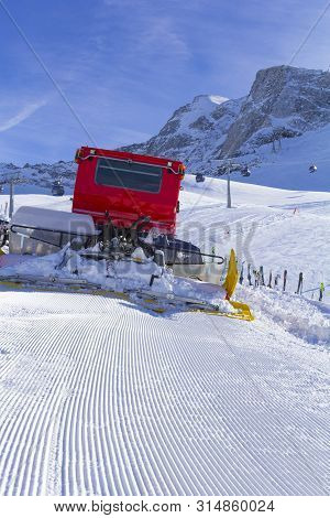 Snowplow Clears Tracks In The Ski Resort Of The Hintertuxer In Tyrol, Austria