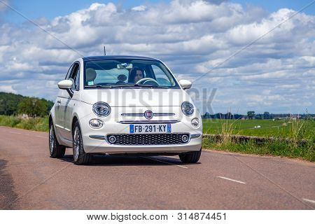 France Lyon 2019-06-20 Closeup Front View Small Compact White Car Hatchback Fiat 500 On The Backgrou