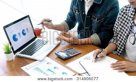 Businessman Work With Friend On The Table With Computer Laptop Calulator ,working Data Analyses For 