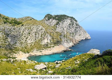 Sea Bay With Turquoise Water, Beach And Mountains, Cala Figuera On Cap Formentor