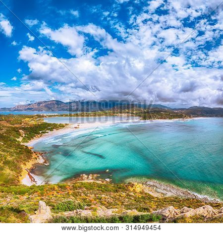 Fantastic View On Lagoon Of Porto Giunco With Turquoise Water And Old Tower. Location: Villasimius, 